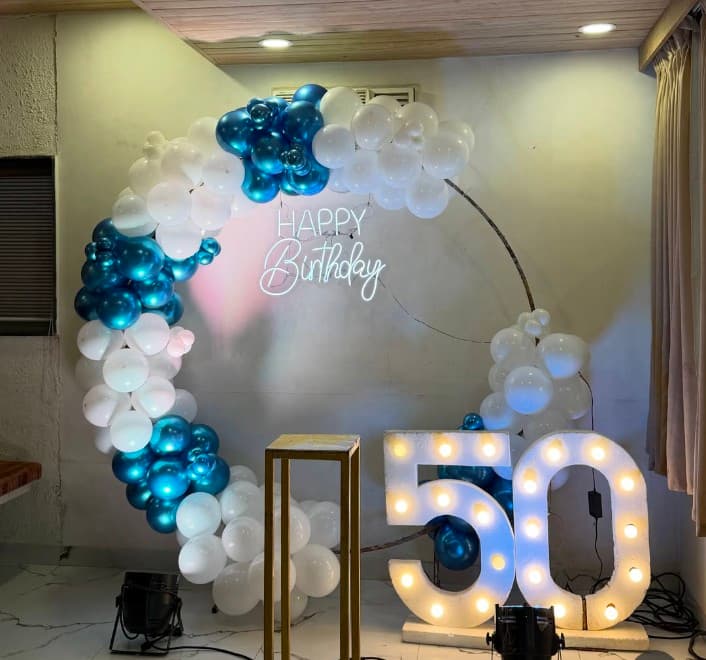 Adult birthday balloon decoration setup in Patna