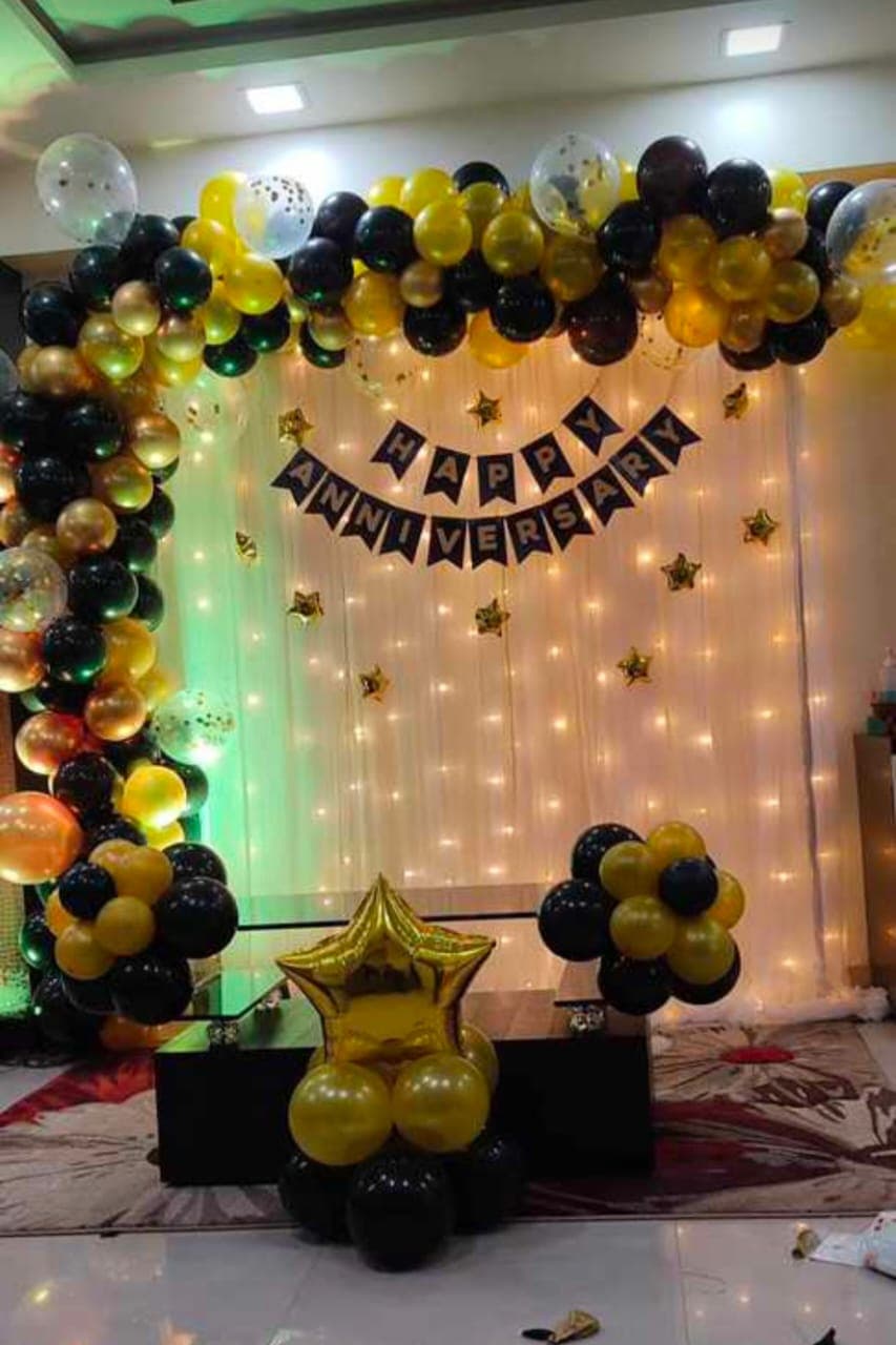 Anniversary balloon decoration with heart backdrop and lighting in Patna