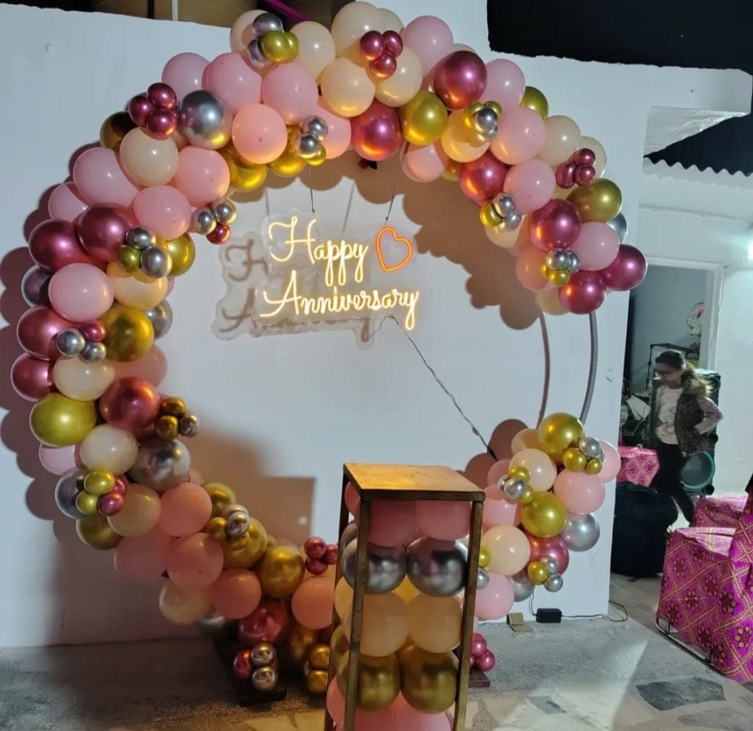 Anniversary balloon decoration with heart backdrop and lighting in Patna