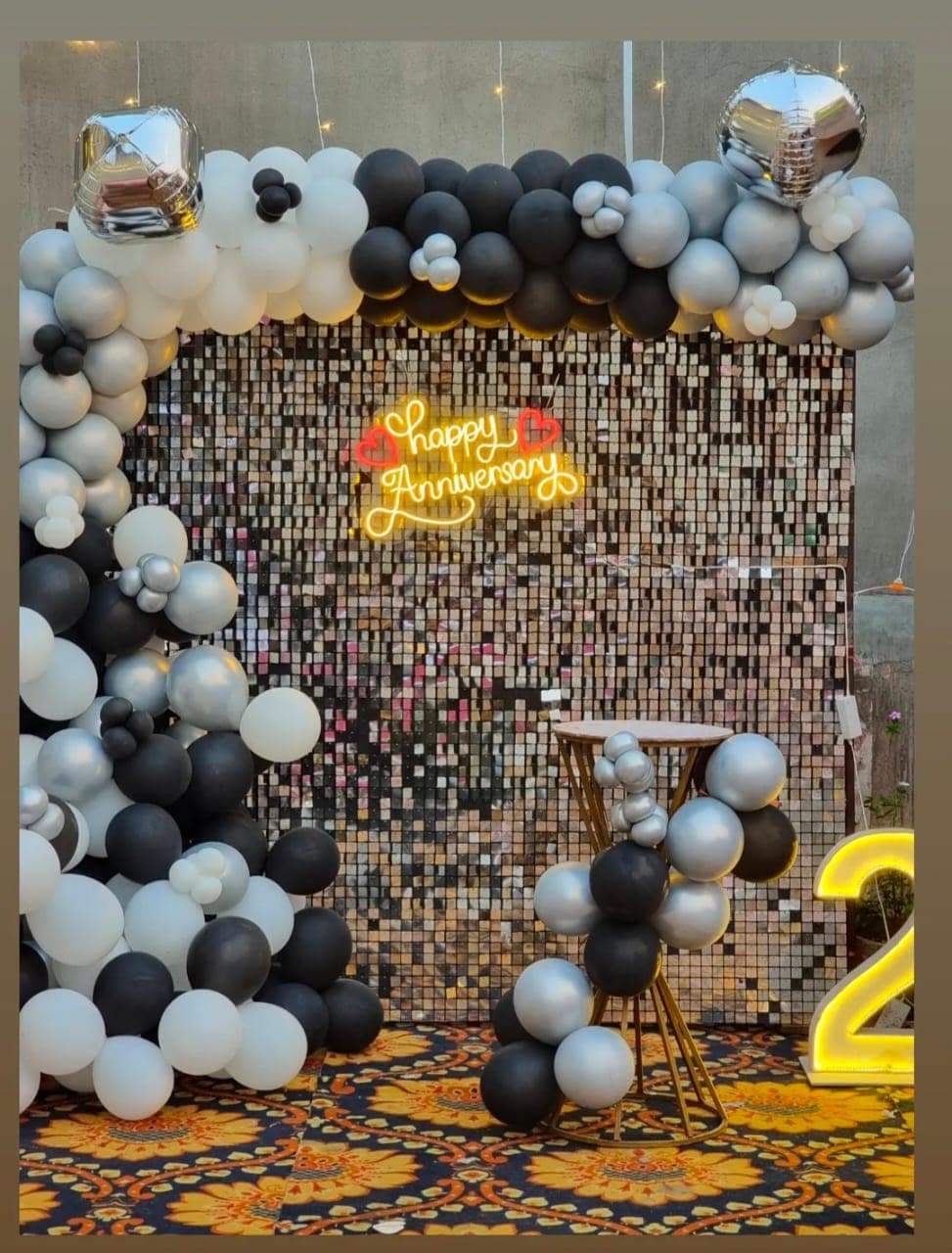 Anniversary balloon decoration with heart backdrop and lighting in Patna
