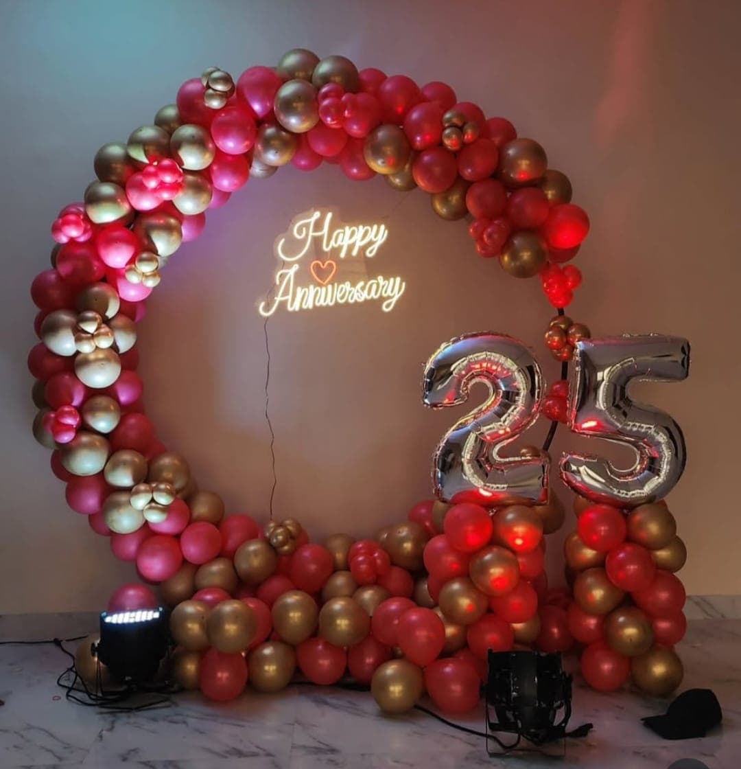 Anniversary balloon decoration with heart backdrop and lighting in Patna