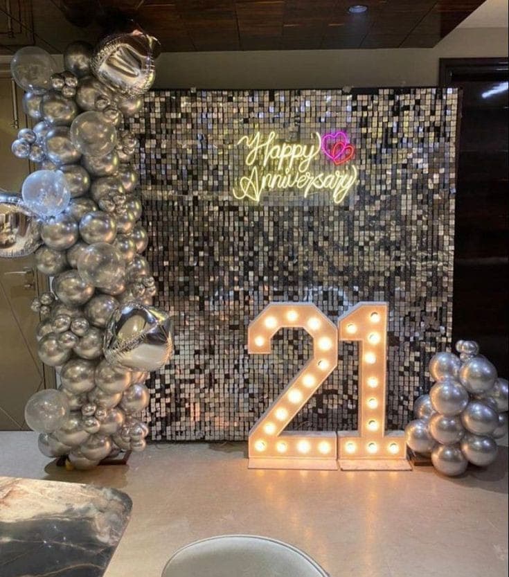 Anniversary balloon decoration with heart backdrop and lighting in Patna