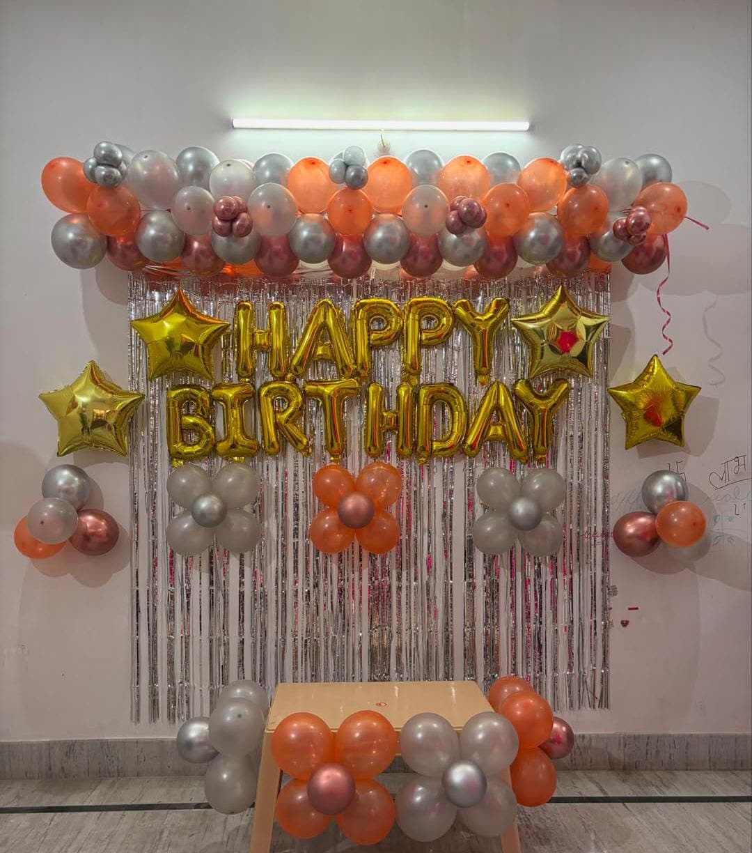 Anniversary balloon decoration with heart backdrop and lighting in Patna