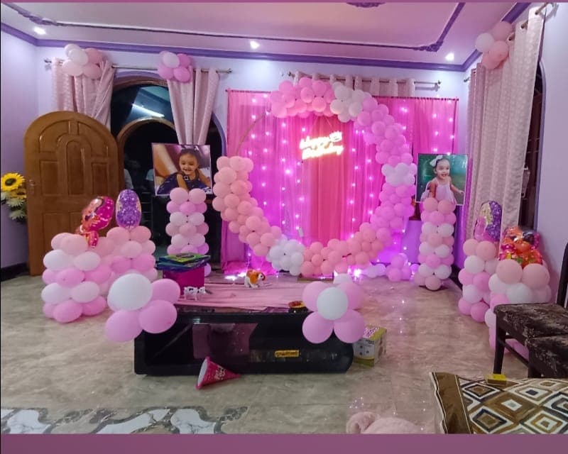 Baby girl welcome decoration in pink and pastel balloons in Patna