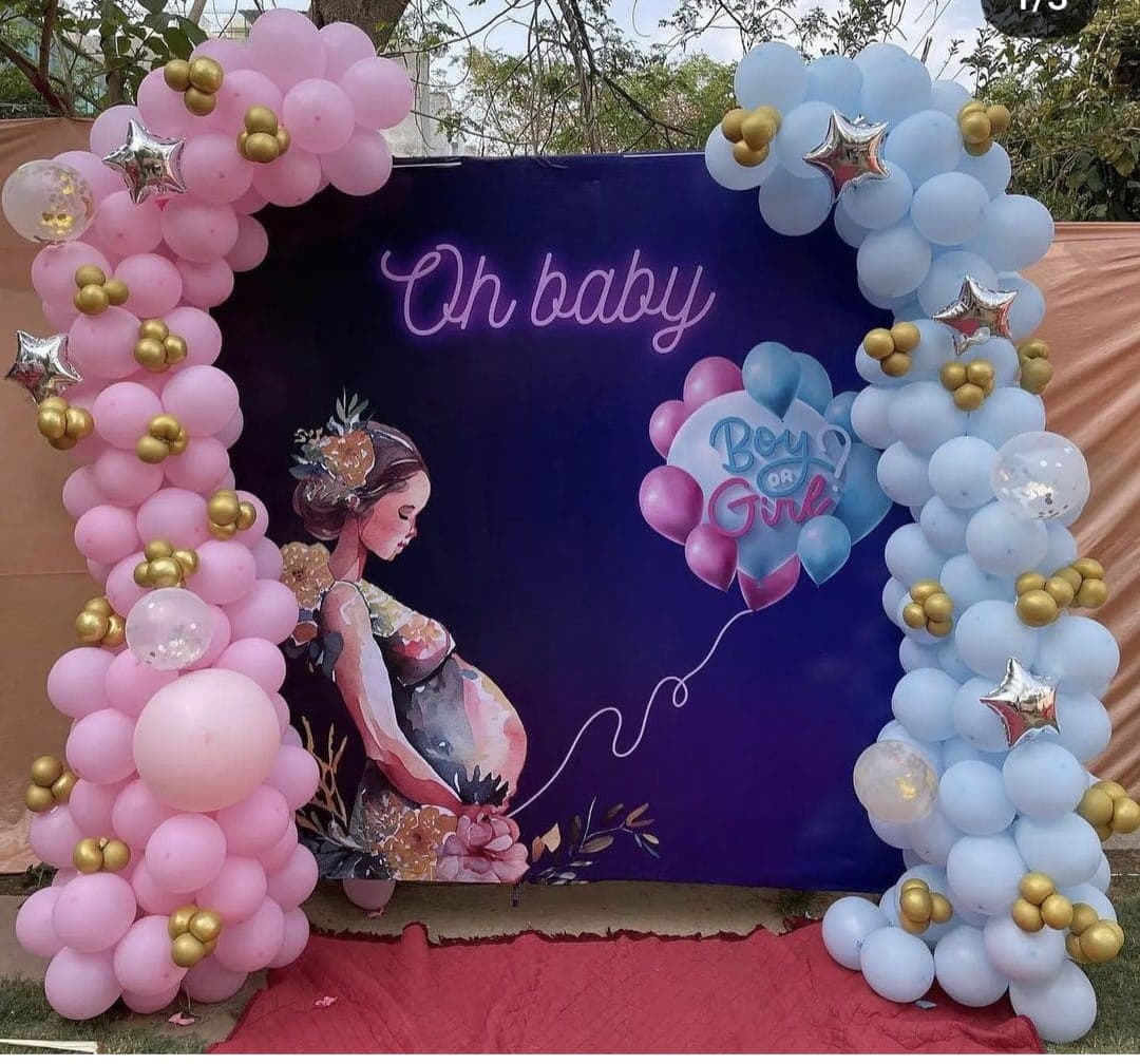 Baby shower balloon decoration with pastel arch and seating in Patna