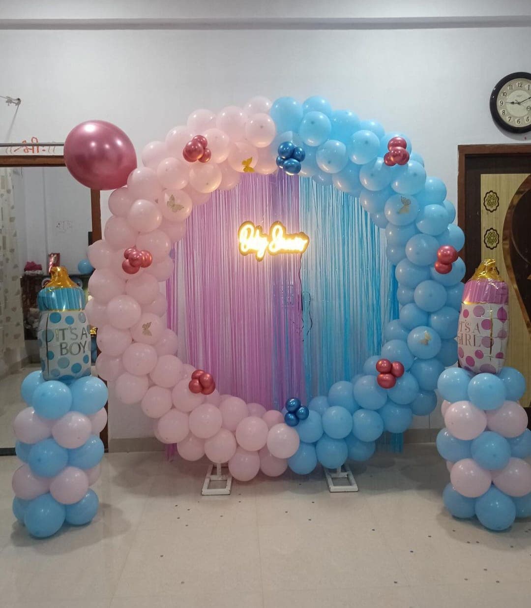Baby shower balloon decoration with pastel arch and seating in Patna