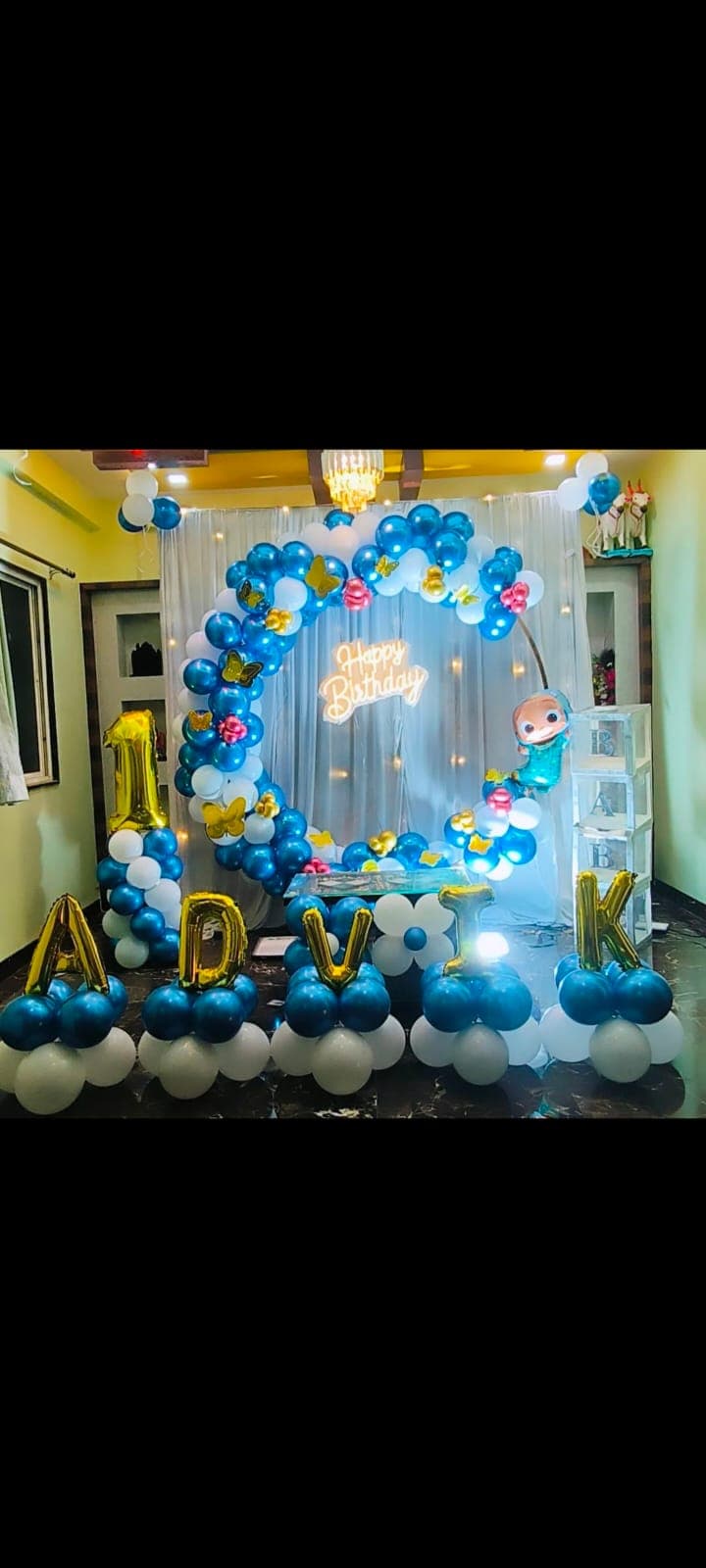 Birthday balloon decoration with backdrop and cake table in Patna